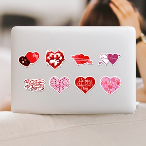 Waterproof heart graffiti stickers for Valentine's Day decor on laptop surface