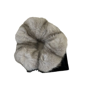 Furry plush scrunchies in grey and brown faux fur for high ponytail hairstyles