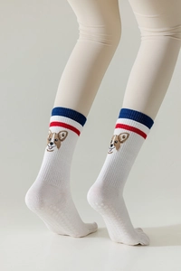 Detail of white cotton yoga toe socks with Corgi embroidery and colored stripes