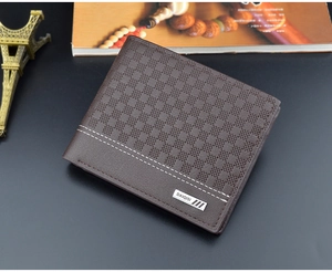 Detail of dark brown leather wallet showing plaid embossing and metal logo plaque