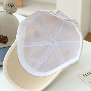 Inside detail of a cute teddy bear toddler sun hat with soft sweatband and reinforcement