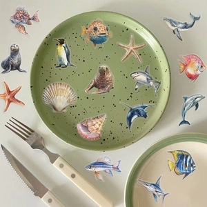 Detailed watercolor ocean life stickers featuring a killer whale and various sea creatures