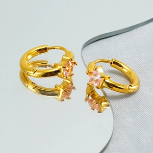 Elegant gold hoop earrings featuring a pink star-shaped zircon with a mirror reflection