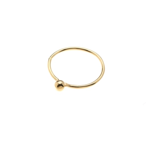 Polished golden stainless steel nose ring hoop with small bead on white background