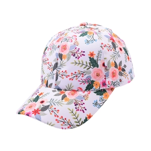 Detail of floral print baseball cap with pink roses and curved brim for girls