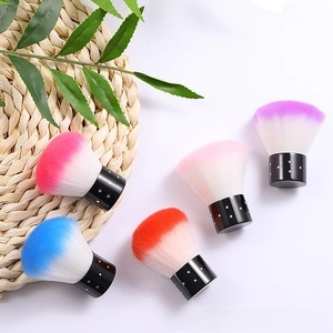 Set of five colorful nail dust cleaning brushes with black polka dot handles and fiber bristles