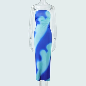 Detail of blue and turquoise gradient tie-dye strapless maxi dress with side slit
