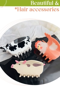 Three cute animal hair claws featuring cow, chicken, and pig patterns in glossy acetate