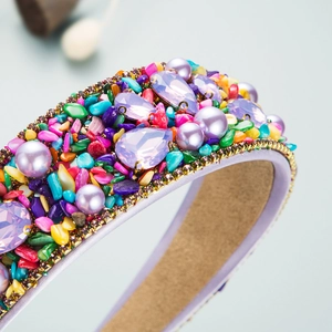 Colorful rhinestone headband with turquoise chips, pearls and purple crystal detail