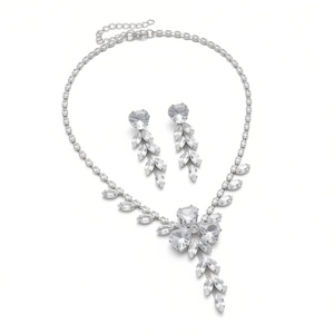 Elegant silver jewelry set with necklace and drop earrings featuring leaf zircon clusters