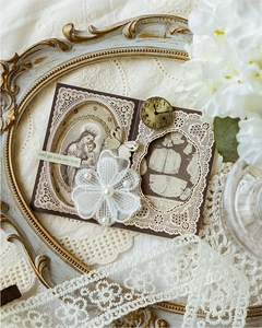Vintage scrapbooking material featuring lace frame, pearl flower and portrait in gold frame