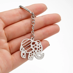 Handheld silver stainless steel elephant keychain with decorative hollow patterns