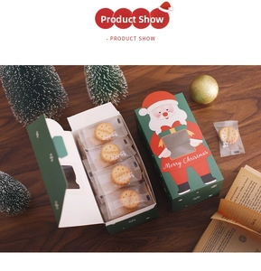 Close-up of green Christmas gift box with Santa Claus and a clear window display