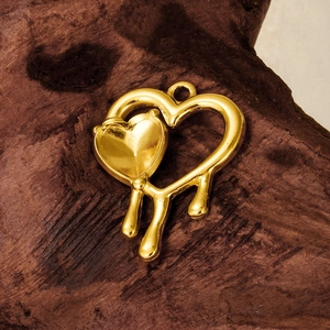 Golden 304 stainless steel hollow heart pendant with melting drop detail for DIY jewelry