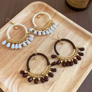 Bohemian cotton rope wrapped hoop earrings with teardrop beads and golden hooks