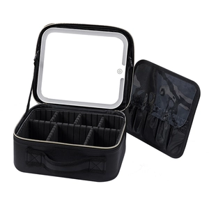 Portable black makeup bag with LED mirror and adjustable dividers for travel storage