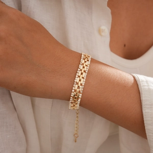 Elegant gold-tone multi-row rhinestone bracelet with geometric hollow links for women