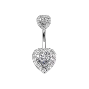 Detail of silver heart belly ring featuring white pavé zircons and a polished metal finish