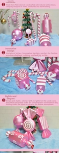Detailed view of pink and white PVC Christmas ornaments including glitter candy canes