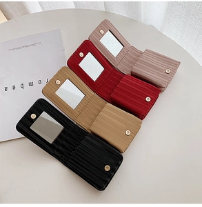 Mini PU leather lipstick case with built-in mirror and quilted vertical stripes