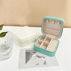 Portable PU leather jewelry box with zipper for rings and earrings storage in mint and white
