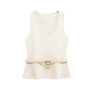 Detail of off-white sleeveless knit top featuring a deep U-neck and belt with tortoise buckle
