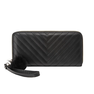 Black V-quilted long zipper wallet for women with wristlet strap and fluffy pom-pom charm