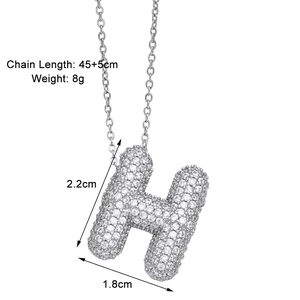 Detailed view of cubic zirconia paved H letter pendant with 45+5cm chain dimensions