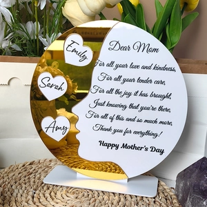 Close-up of a custom Mother's Day plaque with gold mirror acrylic and personalized names