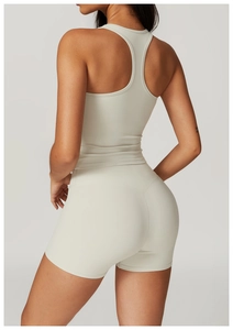 Close-up of racerback sports tank and high-waist shorts in soft brushed fabric