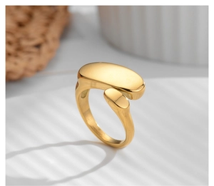 Detailed view of an irregular oval open ring with a polished 18k gold-plated finish