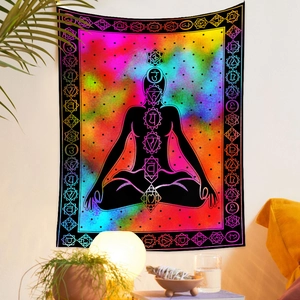 Bohemian tapestry featuring seven chakra silhouettes and a nebula galaxy background decor