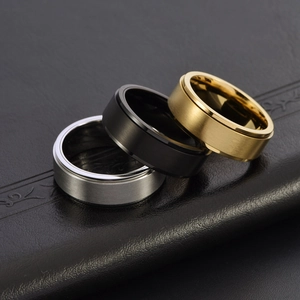 8mm spinner ring in silver, gold, and black finishes with brushed metal texture