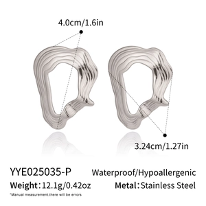 Detailed macro of irregular wavy silver earrings with size and material specifications