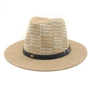 Classic wide brim straw cowboy hat with black leather band and gold star metal accent