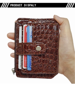 Brown crocodile pattern leather card holder with snap closure and side zipper pocket