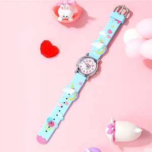 Detailed macro view of 3D unicorn pattern on light blue soft silicone kids watch strap