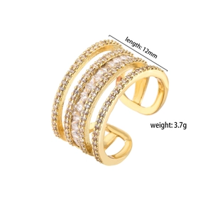 Detail showing multilayered brass ring with clear cubic zirconia and 12mm size spec
