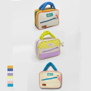 Cute contrast color cosmetic bag with large capacity and lucky patch on white background