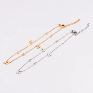 Fashionable gold and silver musical note anklets with sparkling crystals for beach wear
