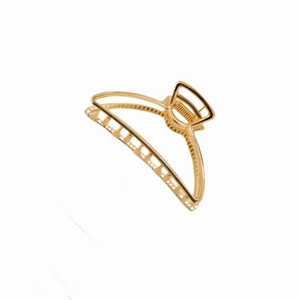 Sleek gold semicircular metal hair claw clip with a polished finish and strong spring
