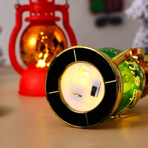 Close-up of the battery compartment and power switch on the base of Christmas lantern