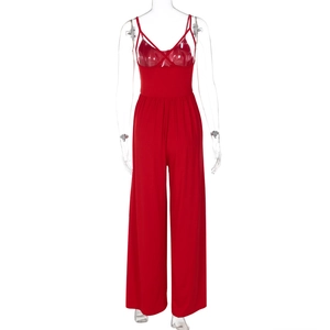 Back view of a red backless wide-leg jumpsuit with slim straps and a cinched waist