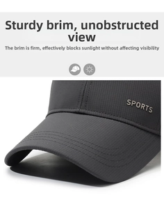 Detail of dark grey baseball cap featuring breathable grid fabric and sports logo