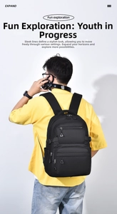 Side view of a black nylon multifunctional backpack with side pockets on male model