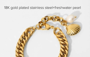 Close-up of 18K gold plated stainless steel chain with shell pendant and freshwater pearl
