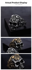 Macro detail of gothic skull ring featuring masonic symbols and vintage engravings