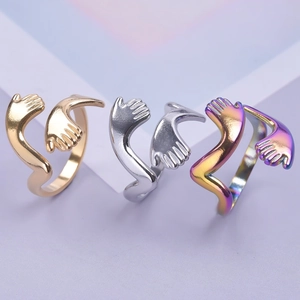 Adjustable hug ring set in gold, silver, and iridescent finishes shown in a side-by-side view