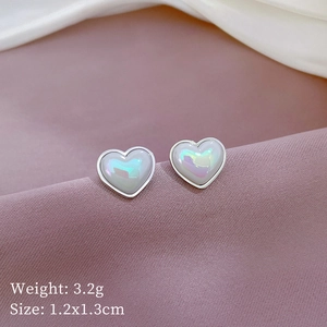 Minimalist mermaid heart stud earrings in iridescent white and silver steel