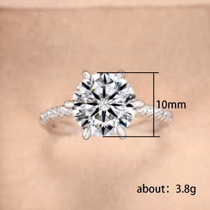 Macro detail of 10mm zirconia engagement ring with six-prong setting and 3.8g silver band